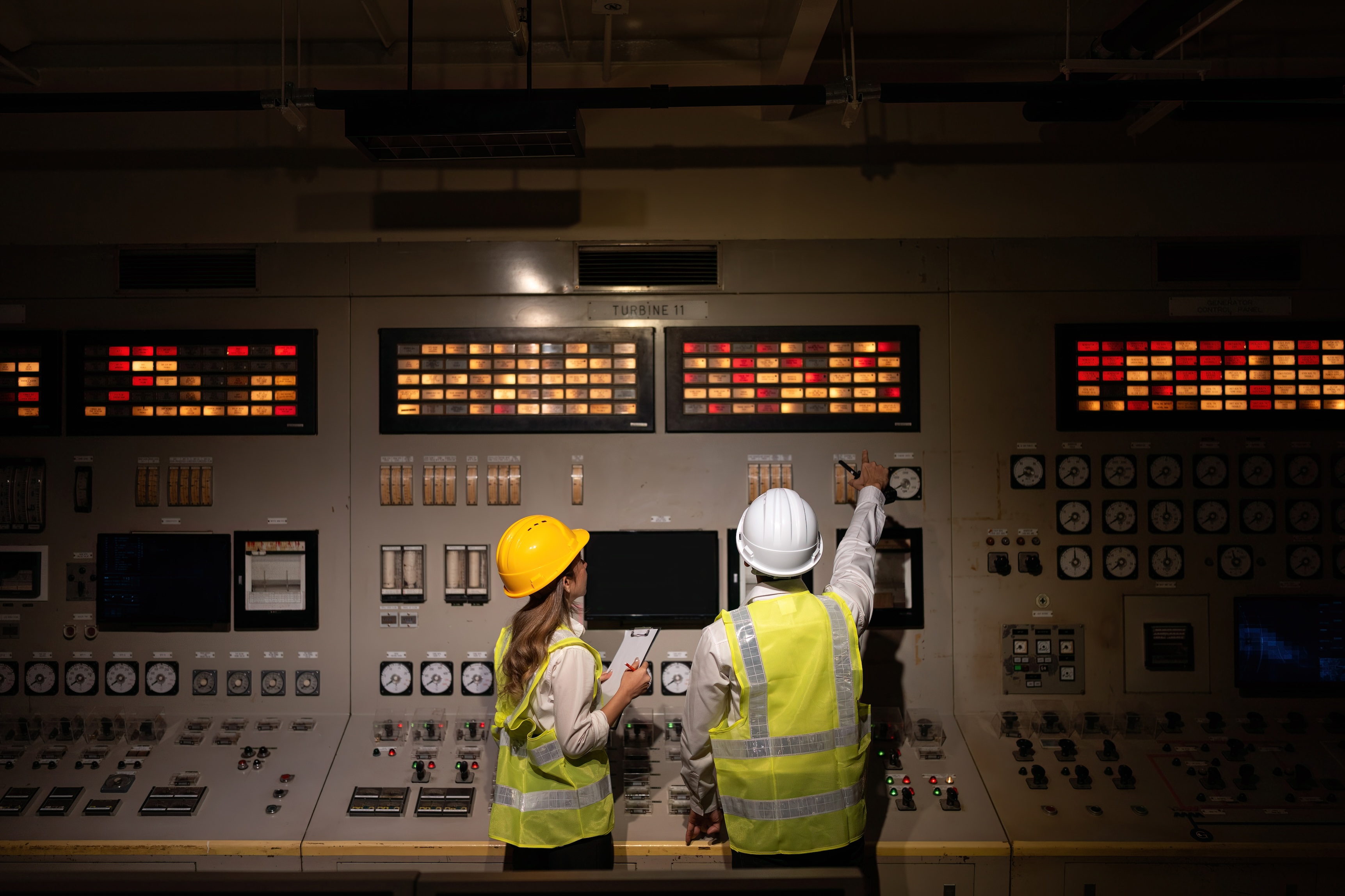 workers at an instrumentation board